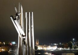 Flood lit Log driver monument in Skien