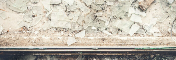 Smashed glass door after a burglary